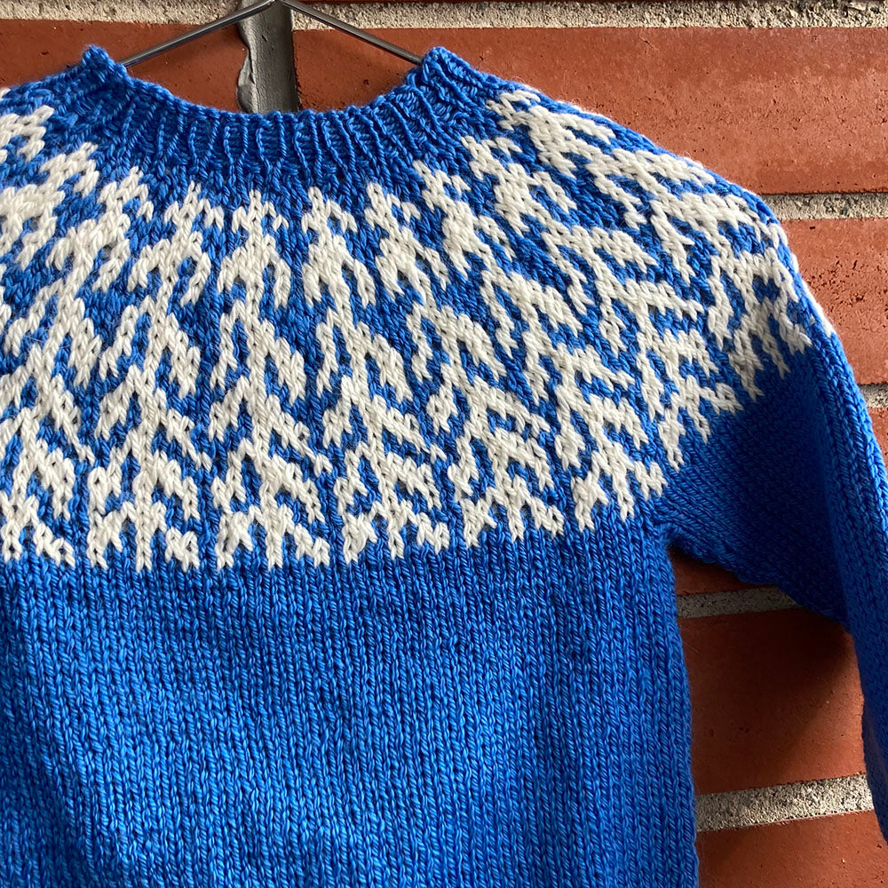 Ohje Korpikuuset -kaarrokeneule lapselle